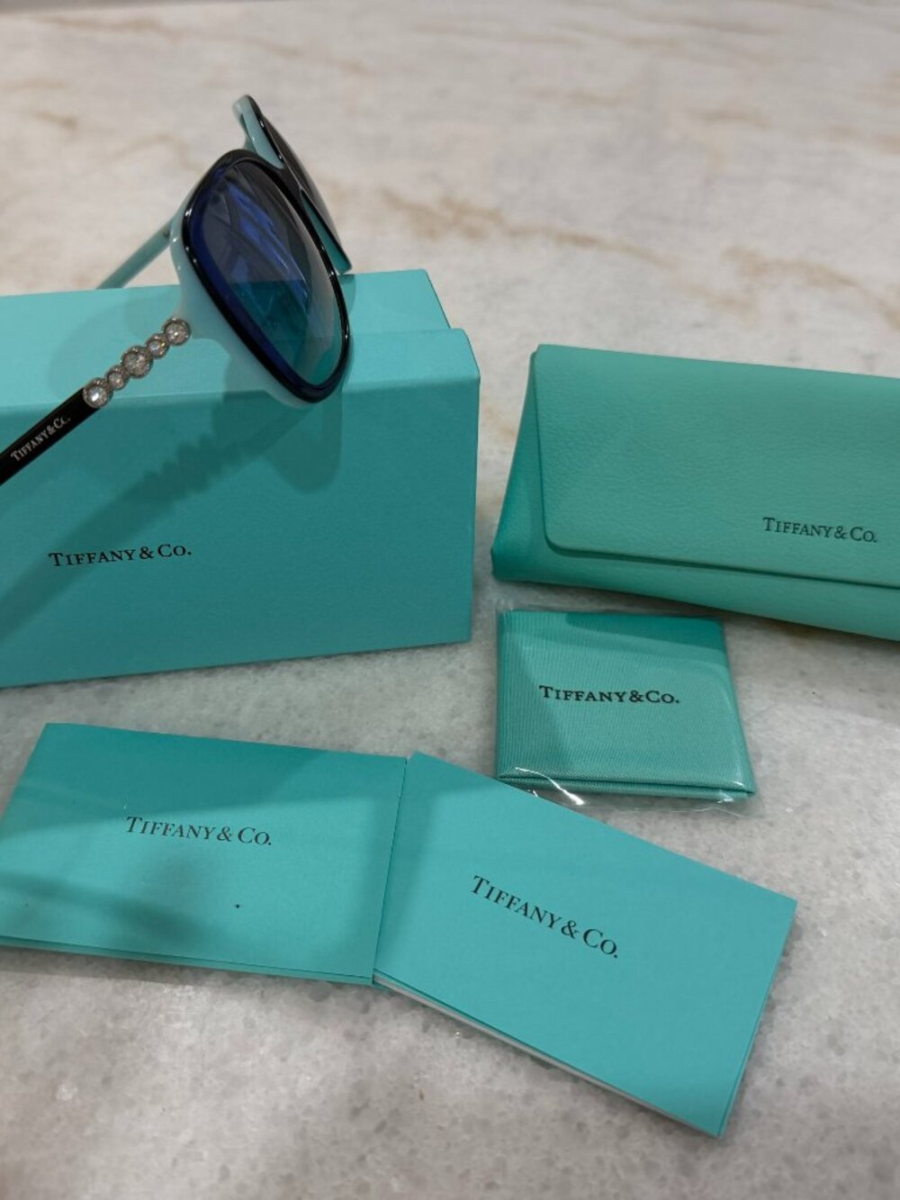 TIffany & Co. Sunglasses - Black Frame, Blue Lenses.